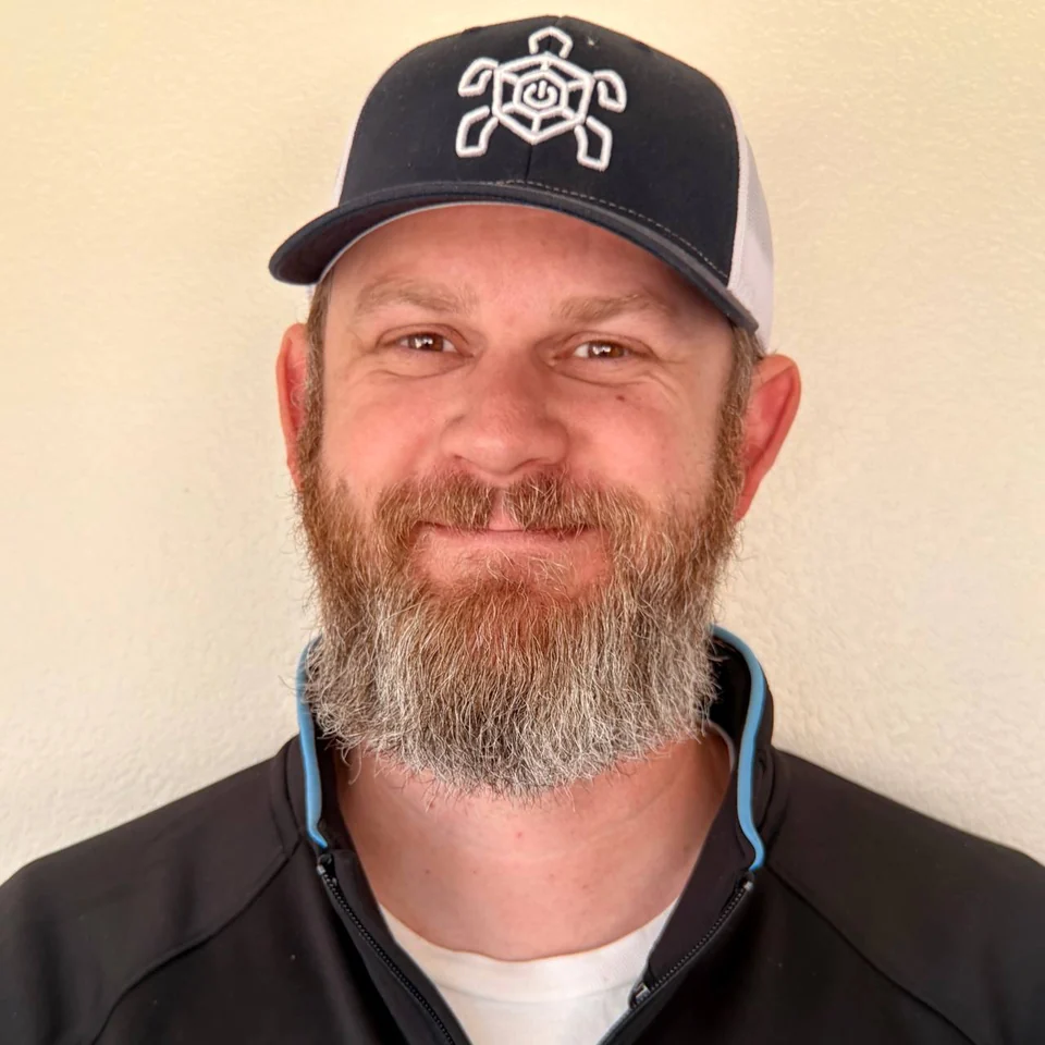 Mason Ball wearing a Tortoise Tech cap